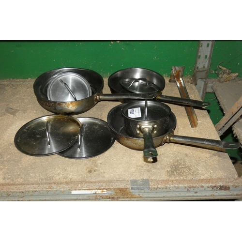 1059 - A quantity of various pots and pans