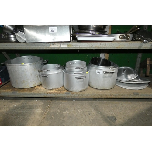 1073 - A quantity of various aluminium stock pots, contents of 1 shelf