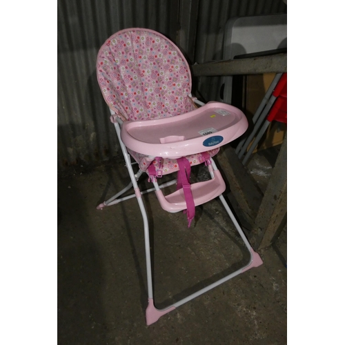 1089 - A child's pink folding high chair