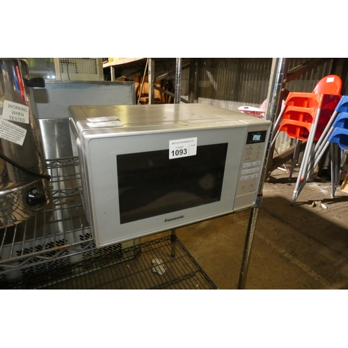 1093 - A microwave oven by Panasonic type NN-E28JMM - trade Tested Working