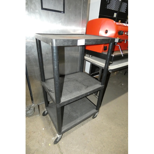 1118 - A black plastic 3 tier trolley