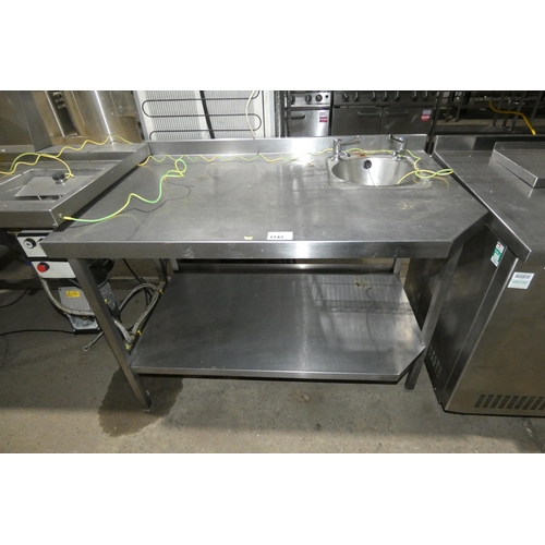 1142 - A commercial stainless steel catering type table with shelf beneath and fitted hand sink