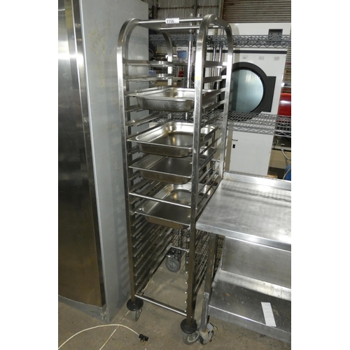 1156 - A commercial stainless steel mobile tray rack with 4 gastronorm trays (32x53 trays)