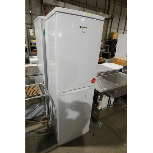 1161 - A tall white fridge freezer by Hoover, requires attention as freezer works but fridge fails to reach... 