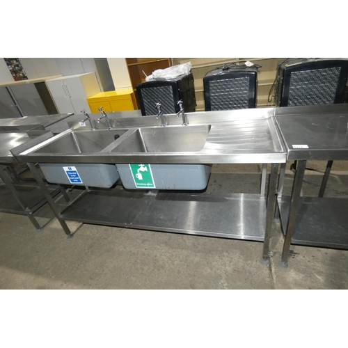 1217 - A commercial stainless steel twin deep sink unit with shelf beneath approx 180x60cm