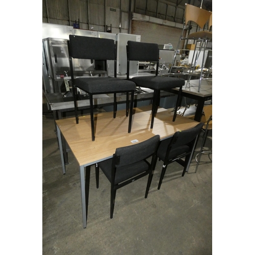 1252 - A wood effect rectangular table approx 140 x 80cm and 4 x black upholstered chairs