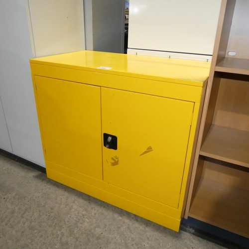 1260 - A metal yellow COSHH cabinet with lock and keys