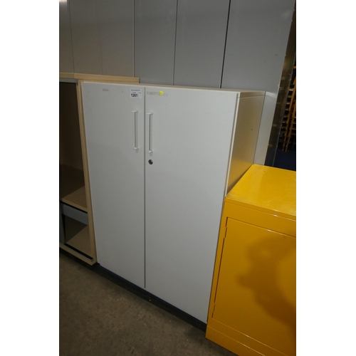 1261 - A white 2 door office cabinet approx 80x50x117cm