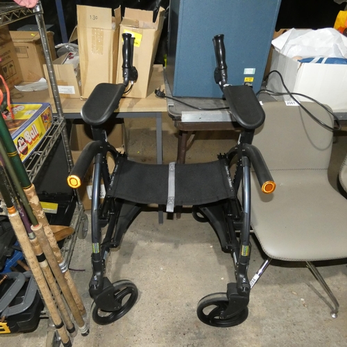 2060 - A folding walking aid by Up-Walker with seat and brakes