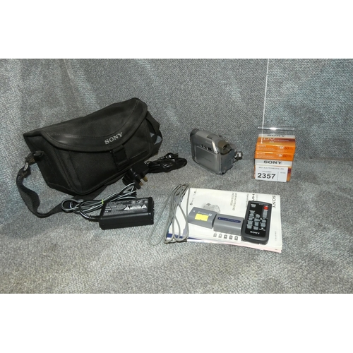 2357 - A Sony mini DV handycam with Carl Zeiss lens, night shot plus mode, 4 blank cassettes, remote, charg... 