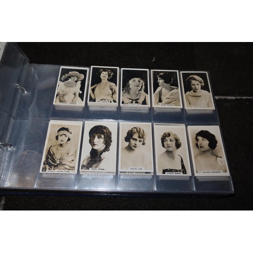 3030 - A collection of miscellaneous vintage cigarette cards and albums etc (2 shelves)