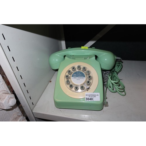 3040 - A green retro dial/push button telephone