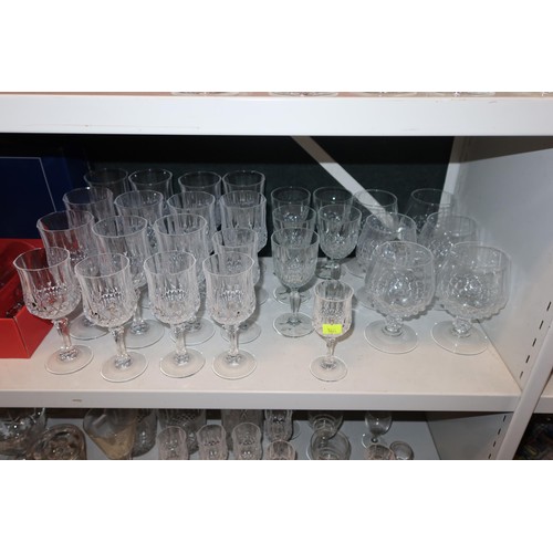 3047 - A quantity of miscellaneous decorative drinking glasses and boxed sets of glasses (three shelves)