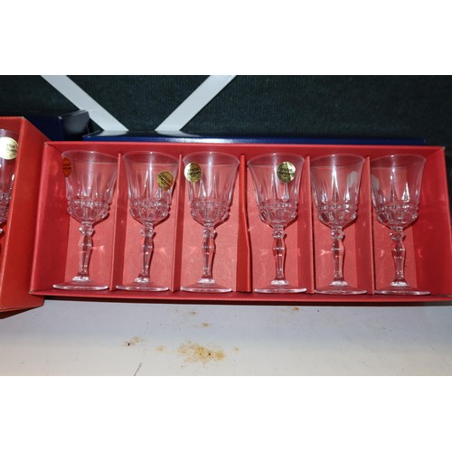 3047 - A quantity of miscellaneous decorative drinking glasses and boxed sets of glasses (three shelves)