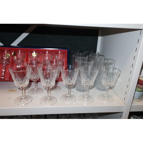 3047 - A quantity of miscellaneous decorative drinking glasses and boxed sets of glasses (three shelves)