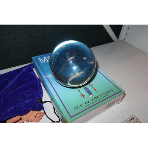 3063 - A crystal ball and a quantity of fortune telling and angel cards etc (one shelf)