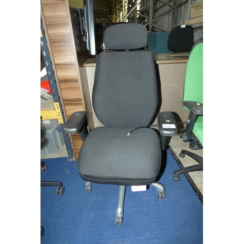 1392 - A high back black upholstered office swivel chair