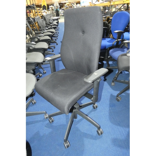 1397 - A black upholstered office swivel chair with lumbar support and high back