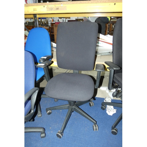 1398 - A black upholstered office swivel chair with lumbar support and high back