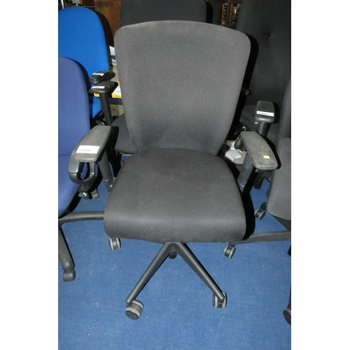 1399 - A black upholstered office swivel chair with high back