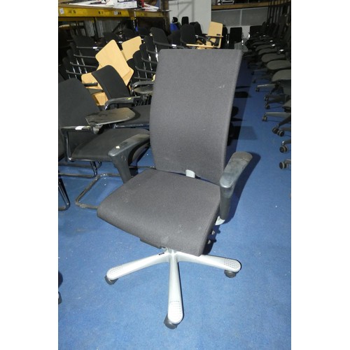 1413 - A black upholstered office swivel chair by Posturite type Credo