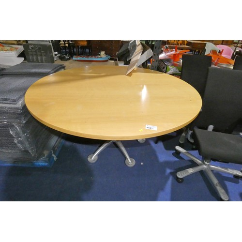 1417 - A large round wood effect table with decorative aluminium metal base approx 150cm