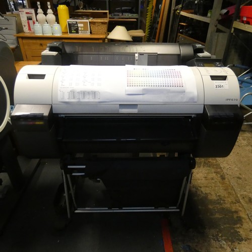 2301 - 2 x Canon Image PROGRAF iPF670 large format printers (610mm / 24 inch), one of which is fitted with ... 