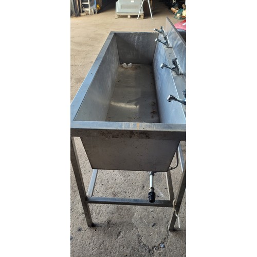 1008A - A long stainless steel single sink unit approx 184*65cm, sink is approx 173*49*33cm