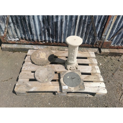 2729 - A decorative 3 piece concrete sundial with signs of the zodiac and a blackbird stepping stone