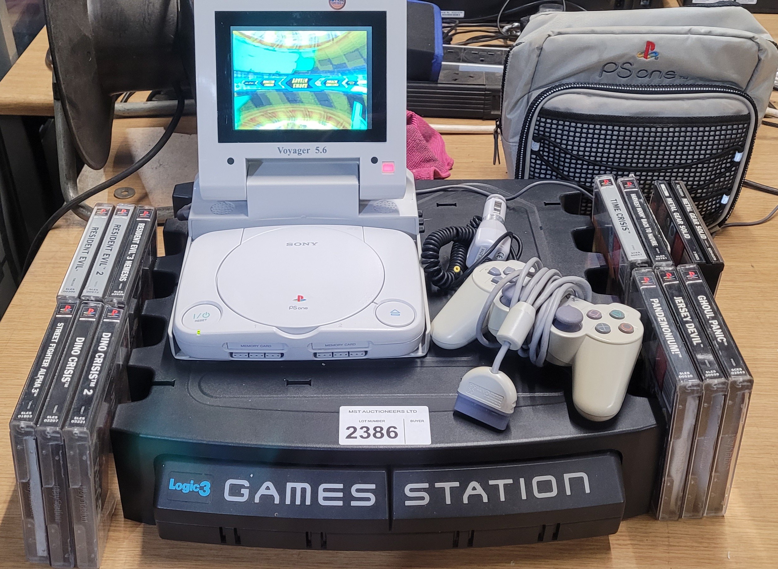A Sony Playstation 1 console with voyager 5.6 in car