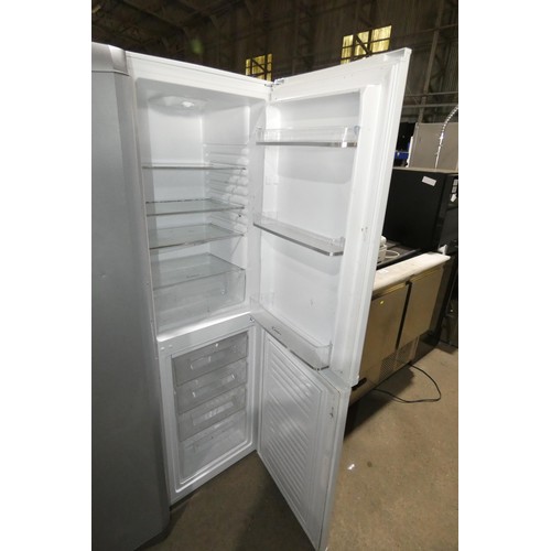 1147 - A tall white fridge freezer by Candy type FD2-33-1 - trade Tested Working