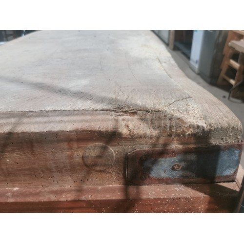 1151 - A large commercial wooden chopping board on a wooden stand approx 156x65x106. Please note this will ... 