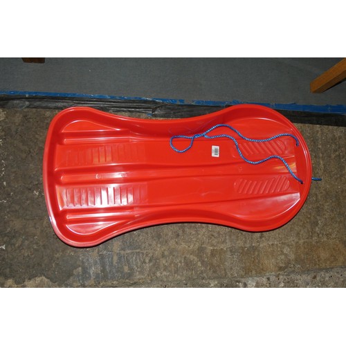 2227 - 10 x red plastic sledges