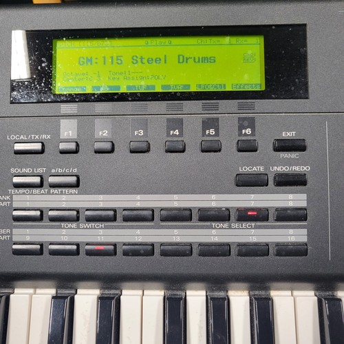 2302 - A portable 76 key midi synthesizer/music workstation/sequencer by Roland type XP-80, Comes with stan... 