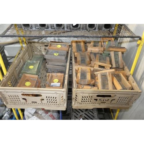 5037 - A quantity of various wooden bird feeders. Contents of 1 shelf and the two plastic crates are not in... 