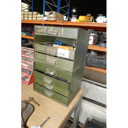 5130 - 2 x small green metal four drawer cabinets each approx 26 x 22 x 21cm high containing various precis... 