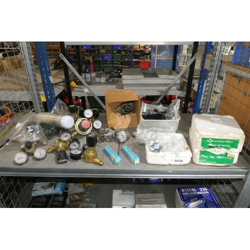 5658 - A quantity of various welding items including replacement welding mask glasses, gas regulating gauge... 