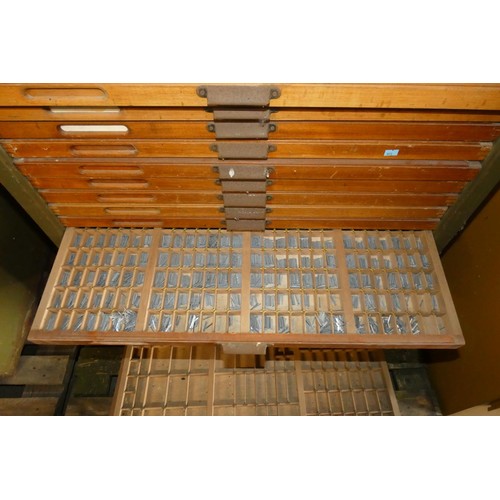 5045 - A vintage metal printers cabinet containing 25 x wooden letterpress trays (some of which contain met... 