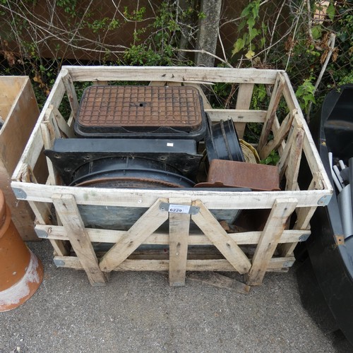 6229 - 1 crate containing a qty of various drain covers