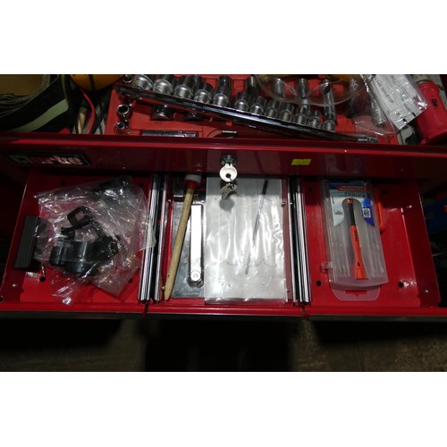 5835 - A Clarke red metal two part wheeled tool cabinet with lift up top and various drawers supplied with ... 