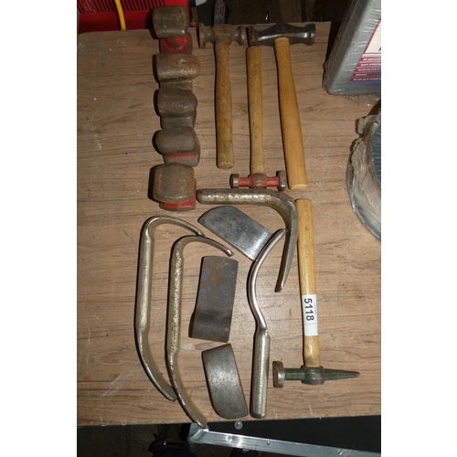 5118 - A quantity of various panel beating dollies and hammers