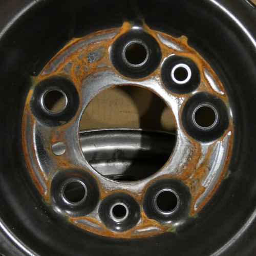 5873 - 4 x silver coloured metal wheels - 5 stud and believed to suit VW