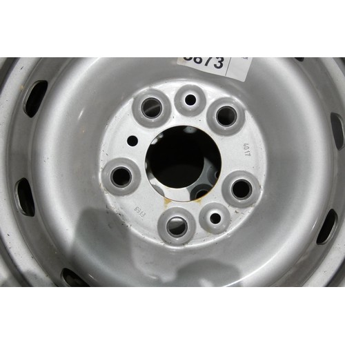 5873 - 4 x silver coloured metal wheels - 5 stud and believed to suit VW