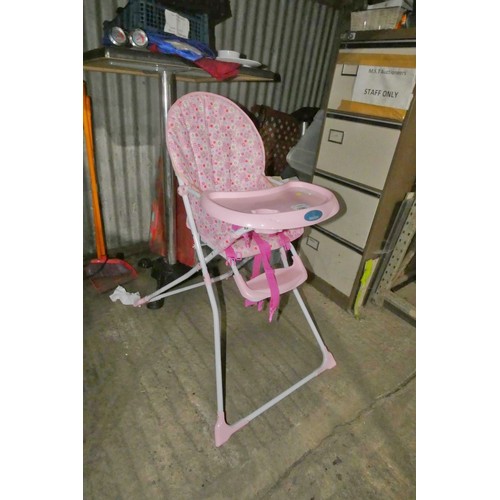 1080 - A child's pink folding high chair