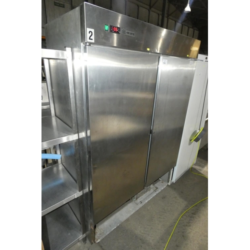 1152 - A large commercial stainless steel double door freezer by Foster no model visible missing bottom gri... 