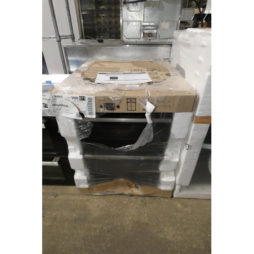 1165 - An unused integrated oven by Bosch type NBS533BS0B. Retail approx £1000