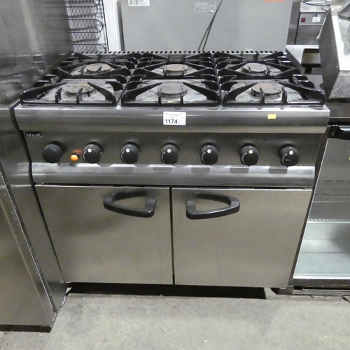 1174 - A gas fired 6 burner range with 2 door oven beneath by Lincat - trade