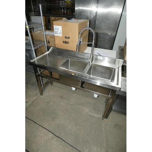 1202 - A commercial stainless steel double sink unit approx 130x51cm