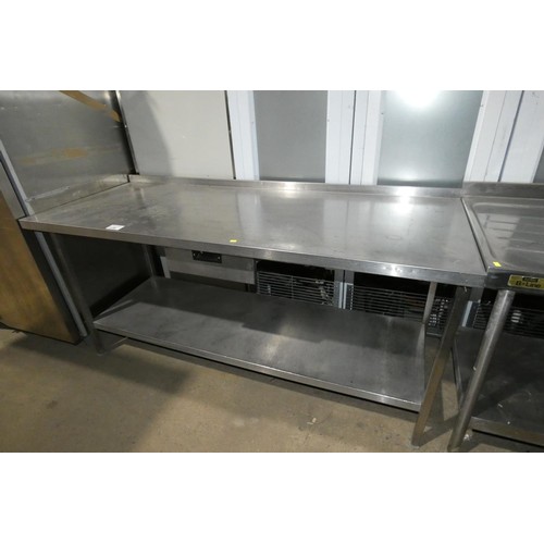 1139 - A commercial stainless steel catering type table with shelf and drawer beneath approx 180x70cm - leg... 