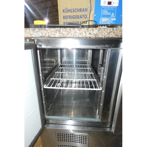 1179 - A commercial stainless steel 3 door bench fridge by Polar, unit has some damage to front grill - tra... 